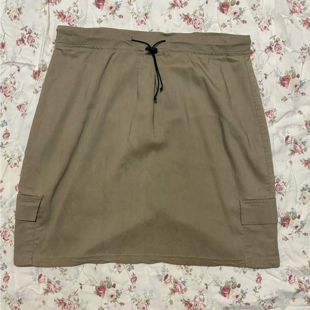 stretchy light brown skirt, with pockets.